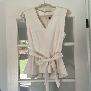 Eva Longoria Elegant Cream Sleeveless Top